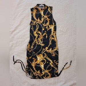Elegant Black and Gold Chain Print Dress